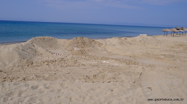 DÜNYACA ÜNLÜ SARIMSAKLI'NIN PLAJ KUMLARINA YAZIK OLUYOR