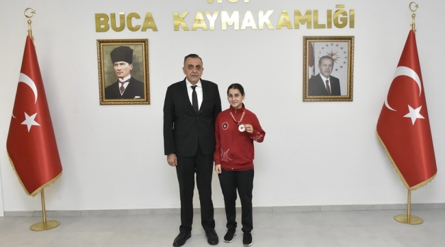 ŞAMPİYON SPORCUDAN KAYMAKAM TUNCER'E ZİYARET